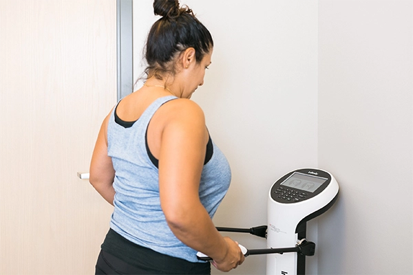 Weight Loss Brookfield WI Woman On Machine